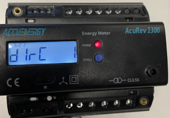 A black energy meter with a displayDescription automatically generated